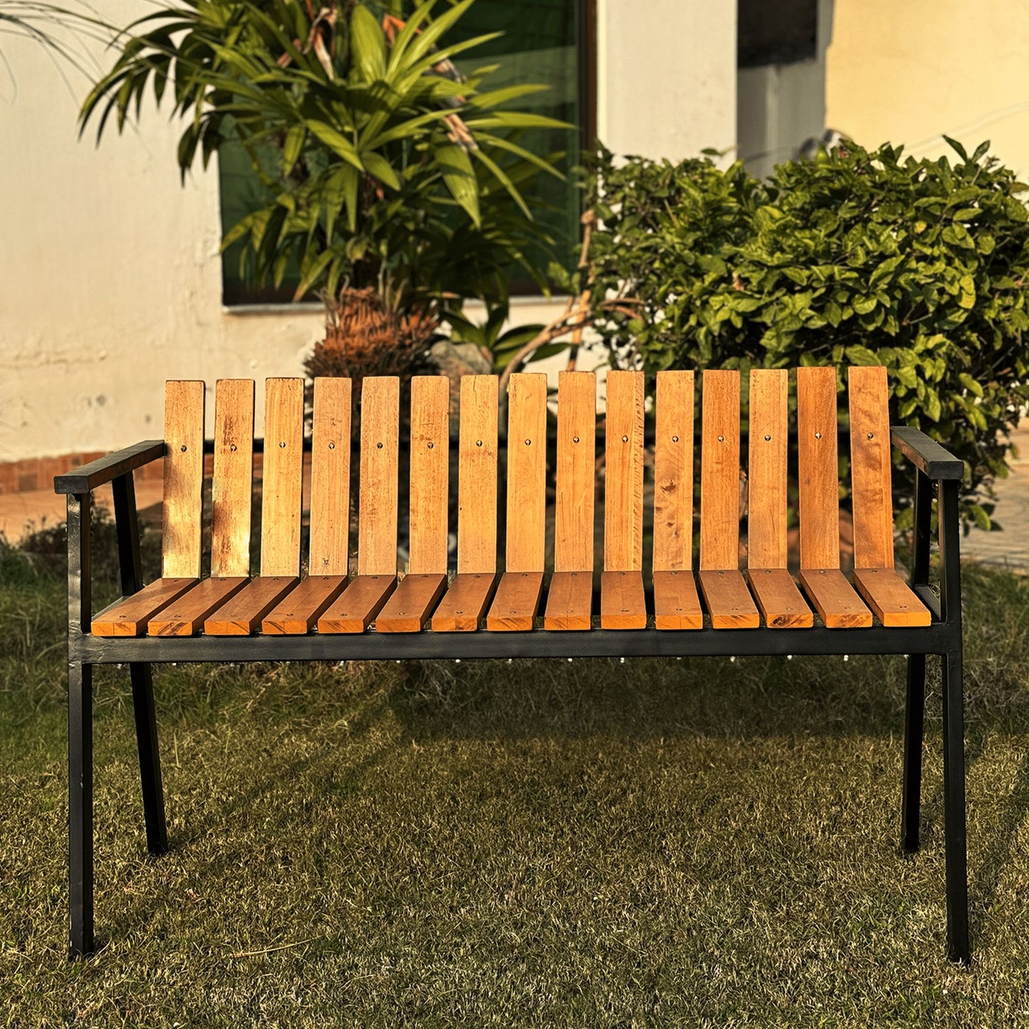 steel and wooden garden bench triangle shaped front